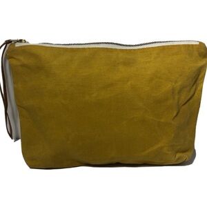 Newton yellow canvas accessory/cosmetic bag.